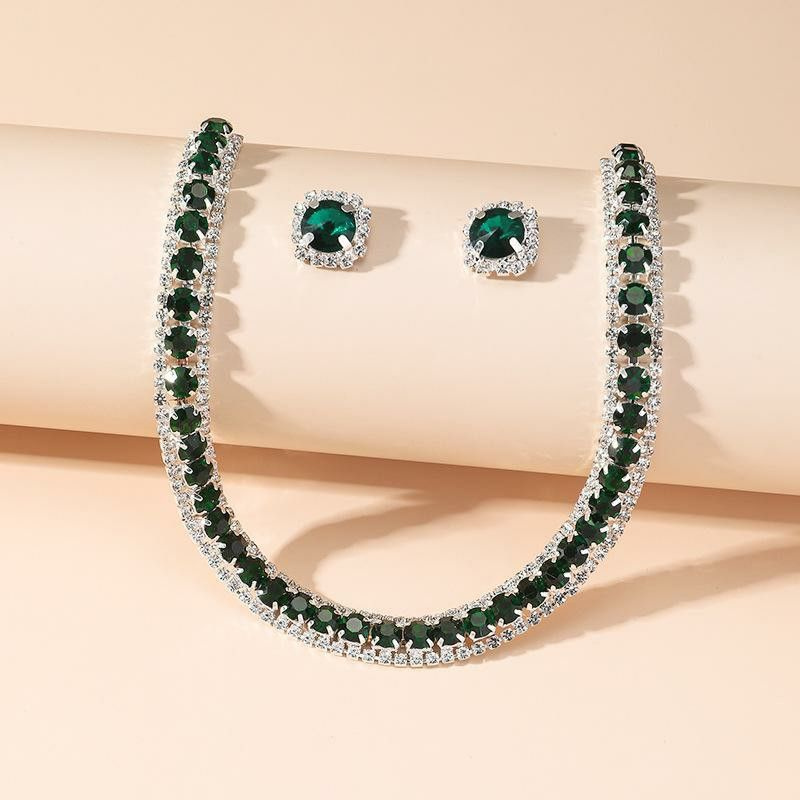 Роскошный комплект серег и ожерелья с зеленым кристаллом  #1