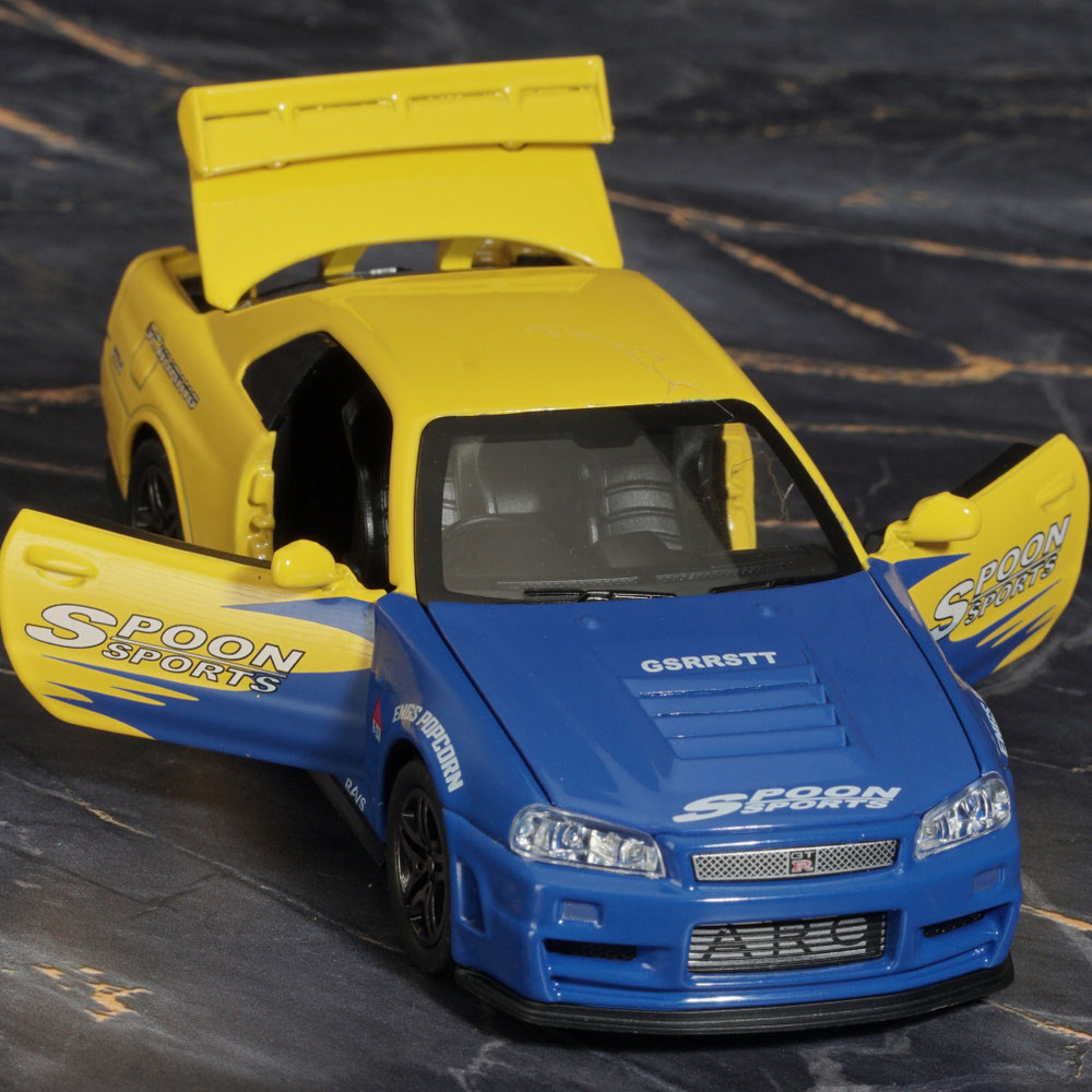 Коллекционная модель машинки Nissan Skyline GT-R R34 (Ниссан ГТР) Годзилла, масштаб 1:32  #1