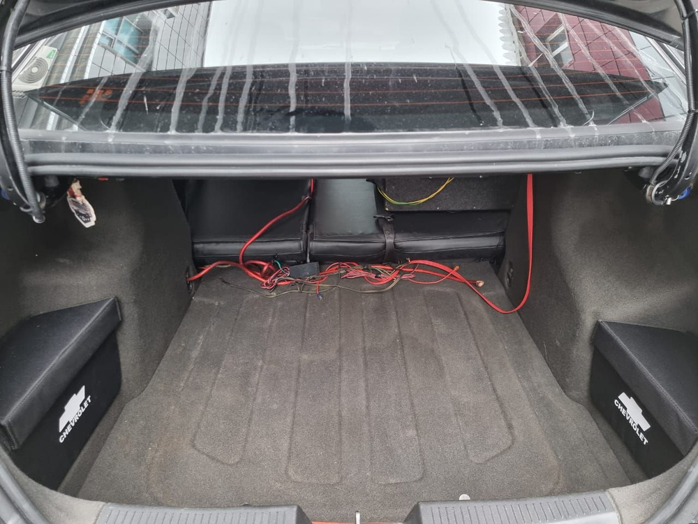Органайзеры в ниши багажника для Chevrolet Aveo T300 #1
