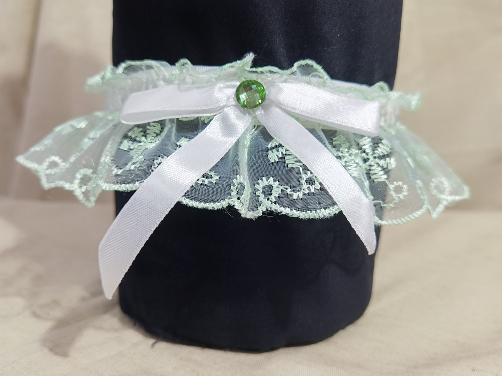Подвязка для невесты кружевная в светло-зеленом цвете. #1
