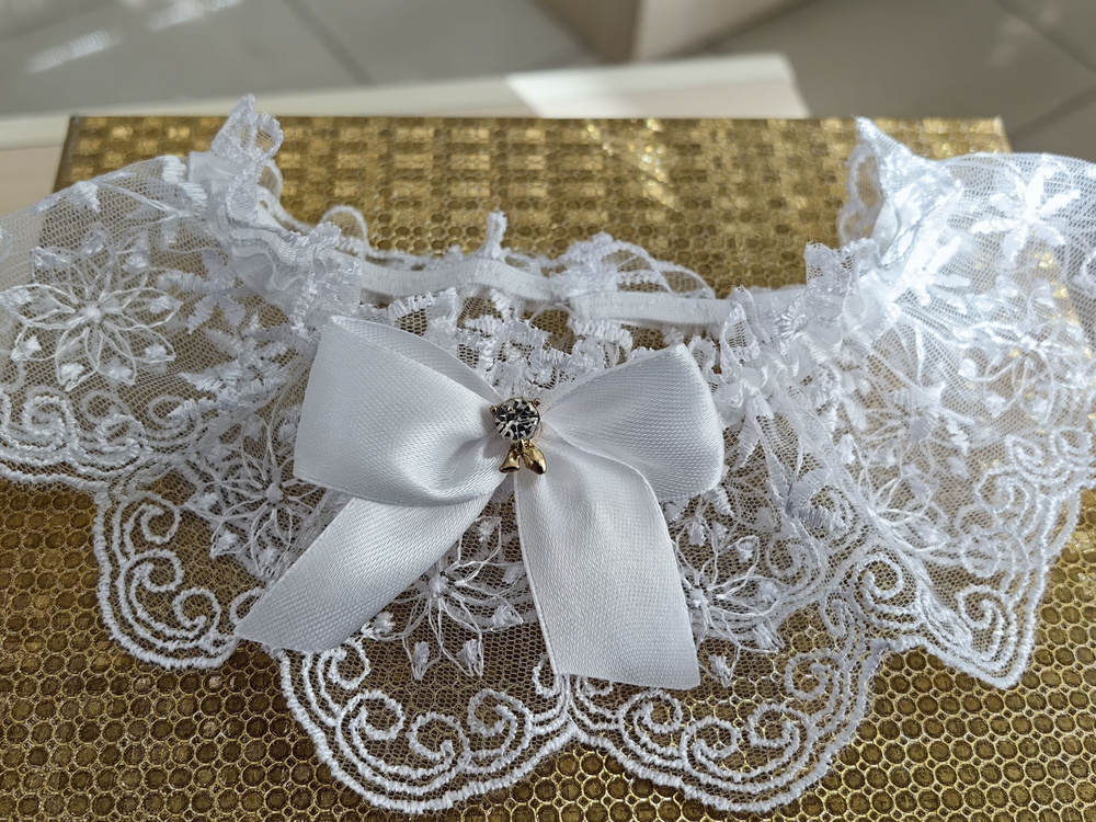 Подвязка для невесты кружевная в белом цвете с бантиком7.  #1