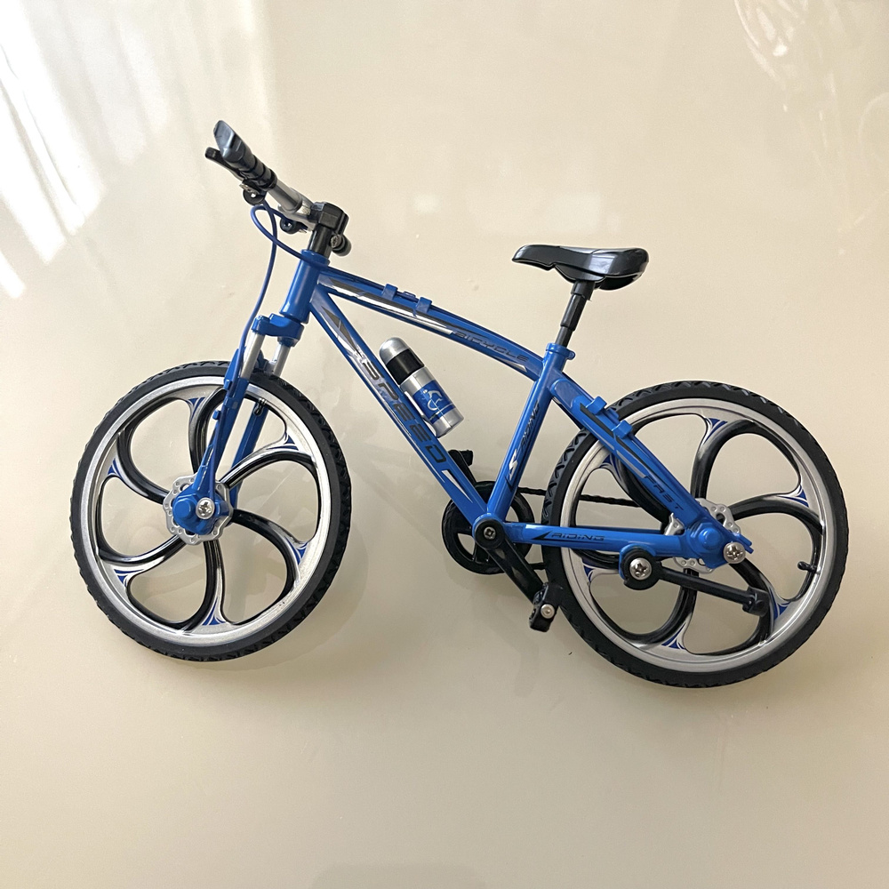 Велосипед игрушечный СИНИЙ 19 см #1