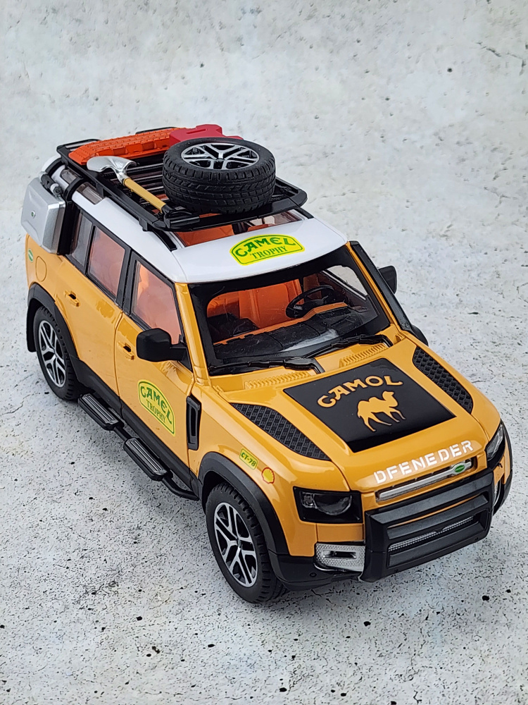 Машинка металлическая Land Rover Defender Camel Trophy инерционная модель Ленд Ровер желтая 1:22 длина #1