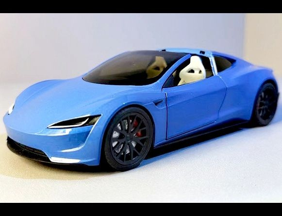 Машинка инерционная Tesla Roadster Space Edition металлическая модель 1:24 синий, со светом и звуком #1