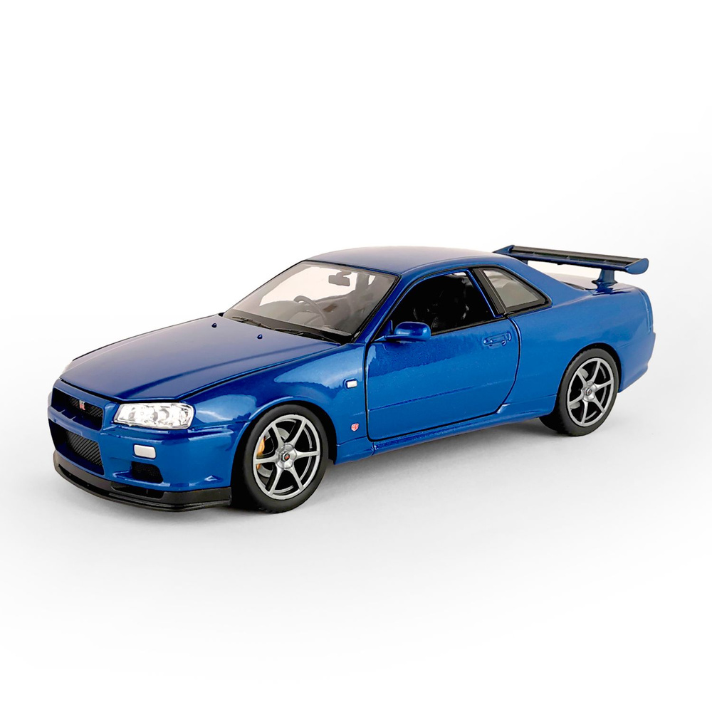 Машинка WELLY 1:24 Nissan Skyline GT-R R34 синий #1