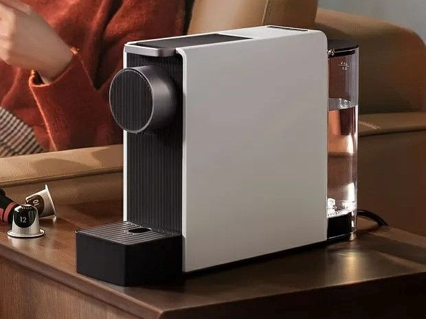 Кофемашина Xiaomi Scishare Capsule Coffee Machine Mini (S1201) — капсульная кофемашина небольшого размера из безопасного и прочного АБС-пластика. Благодаря небольшим размерам прибор отлично смотреться на фоне любого интерьера: на кухне, в гостиной или даже офисе.