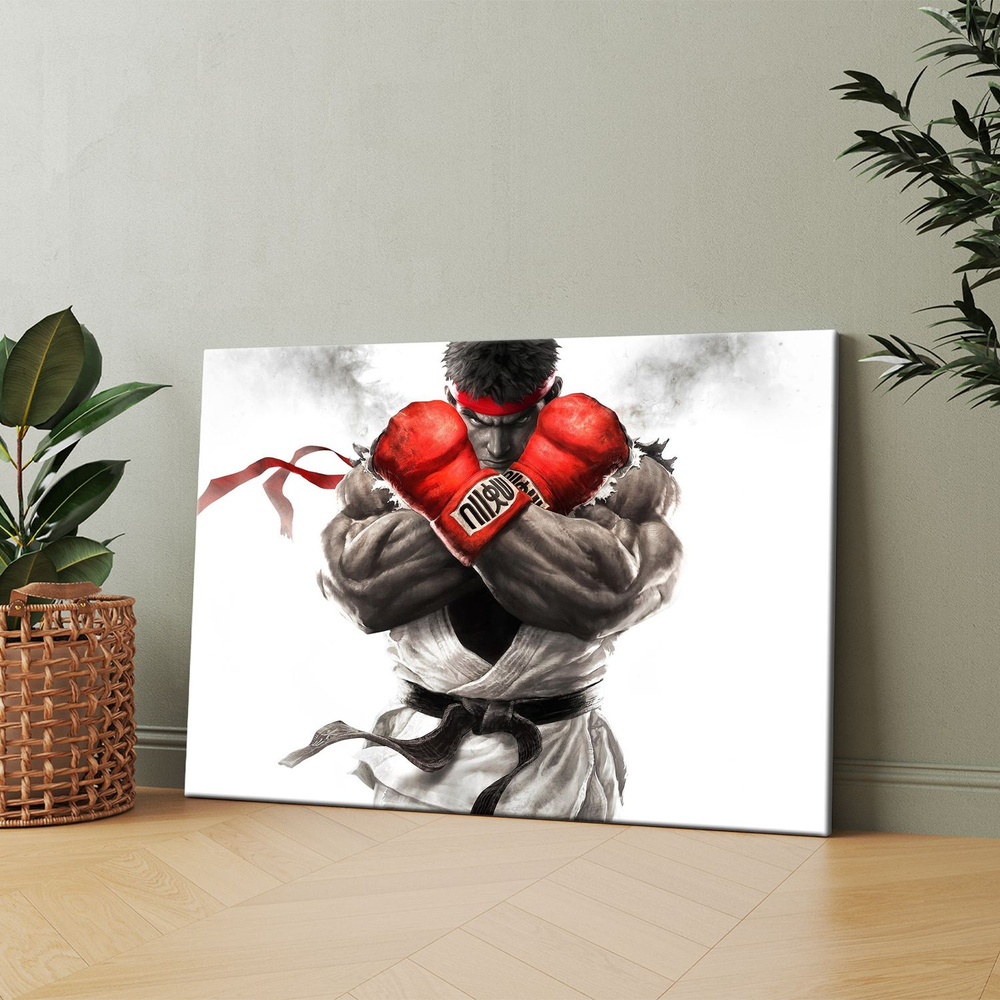 Картина на холсте (Мужчина в экипировке для каратэ держит красную боксерскую перчатку) 50x70 см. Интерьерная, #1