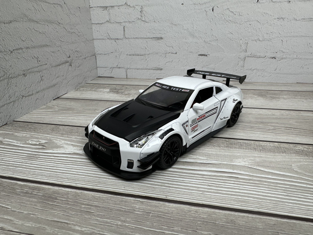 Nissan GTR racing коллекционная металлическая инерционная машинка, модель 1:24 21см НИСАН с открывающимися #1