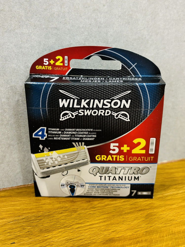 Сменные кассеты для бритья Wilkinson Sword Quattro Titanium Core Motion 7 шт.  #1