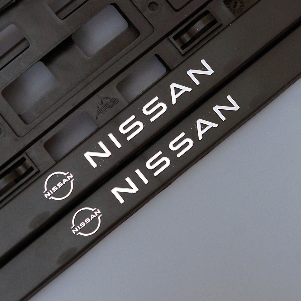Рамки для номеров автомобиля Nissan чёрные 2 шт. #1