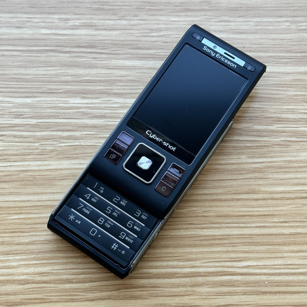 Sony Ericsson Мобильный телефон C905, черный #1