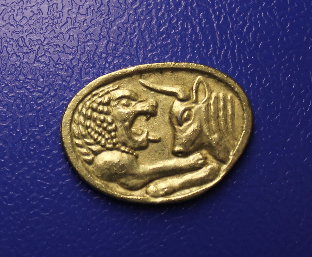 Сувенирная монета Золото магнитного моря Лев и бык #1
