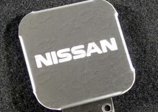 Заглушка на фаркоп под квадрат 50x50 с логотипом Nissan, (нерж.сталь) TCUZNIS1  #1