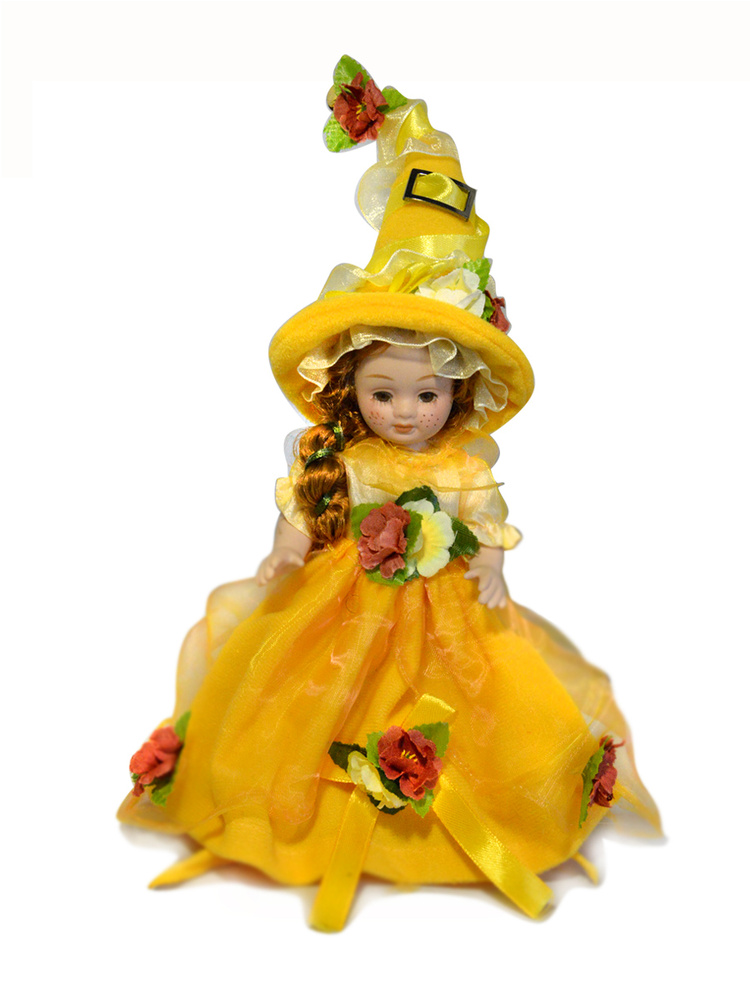 Кукла керамическая фарфоровая декоративная девочка - эльф в колпачке желтая , высота 17 см  #1