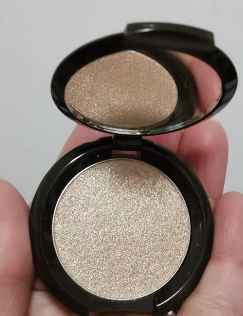Champagne pop highlighter becca online