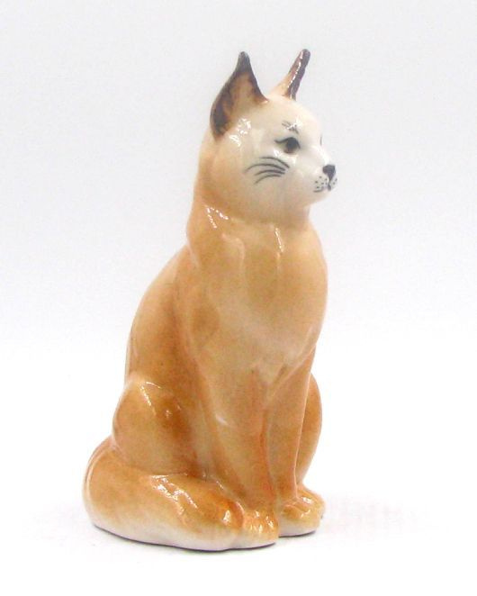 Мейнкун белый с рыжим статуэтка кота из фарфора #1