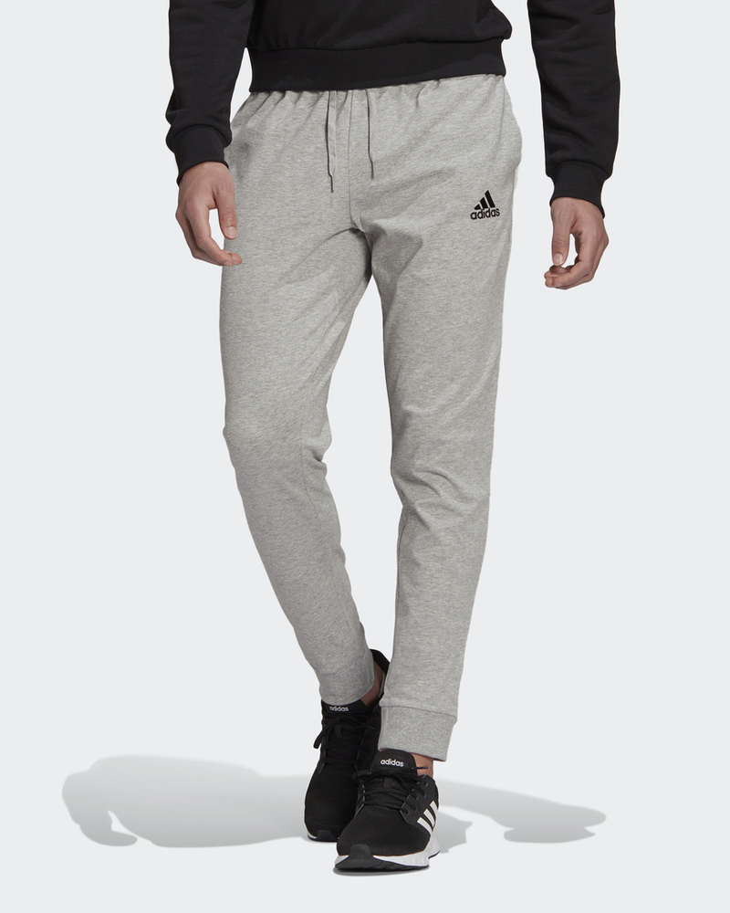 Брюки спортивные adidas Sportswear ESSENTIALS SINGLE JERSEY TAPERED CUFF Joggers #1