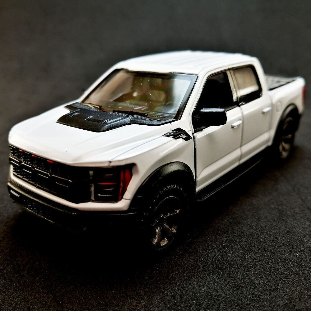 Машинка металлическая Kinsmart 1:46 2022 Ford F-150 Raptor (Форд Раптор) 5436DKT инерционная, двери открываются #1