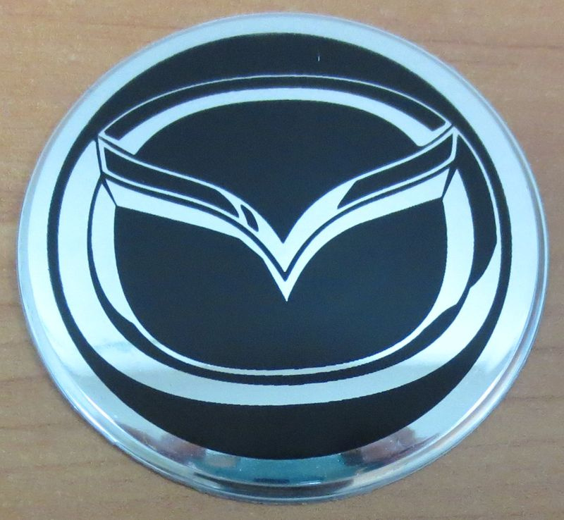 Наклейка "Mazda" (диаметр 60мм.) на автомобильные колпаки, диски, компл. 4шт.  #1