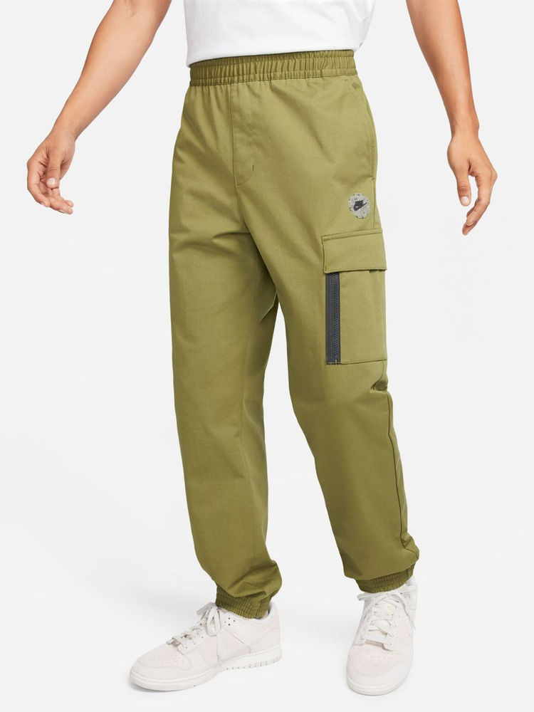 Брюки спортивные Nike M Nsw Spu Wvn Pant #1