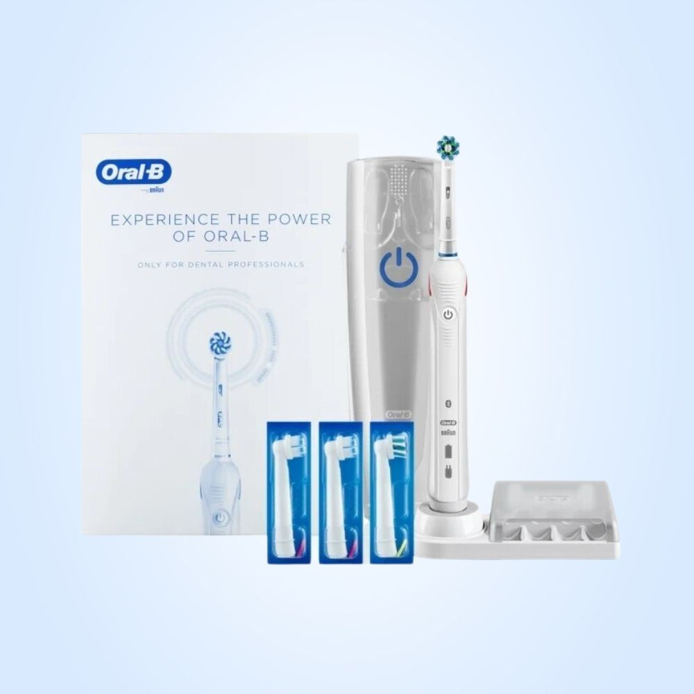 Электрическая зубная щетка Oral-B Smart4 4000 (футляр, 4 насадки)  #1