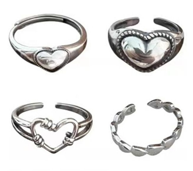 Комплект из 4 безразмерных колец "Серебристые сердечки"  #1