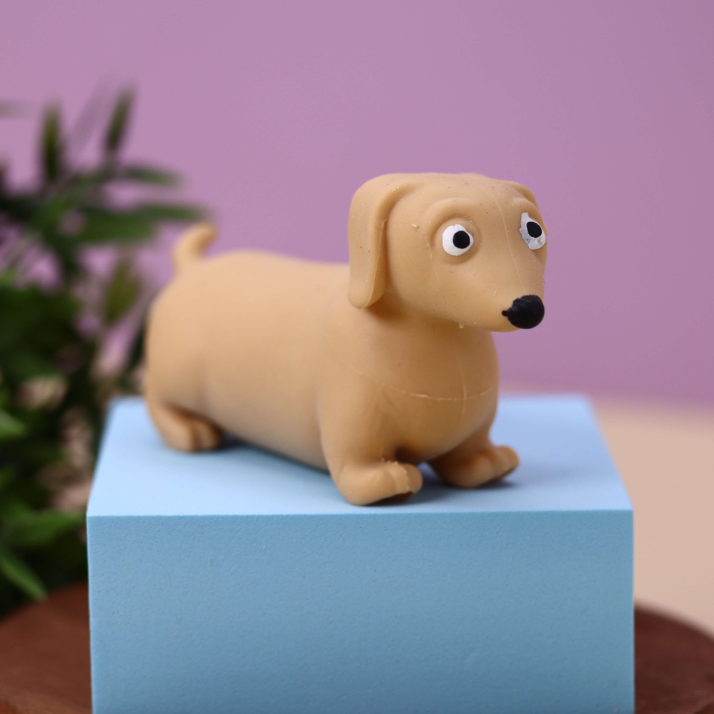 Игрушка антистресс мялка для детей Stretchy dachshund beige #1