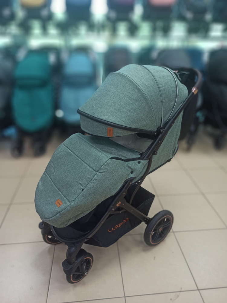 Прогулочная коляска luxmom 609 с сумкой-рюкзаком для мамы. Цвет: Зеленый  #1