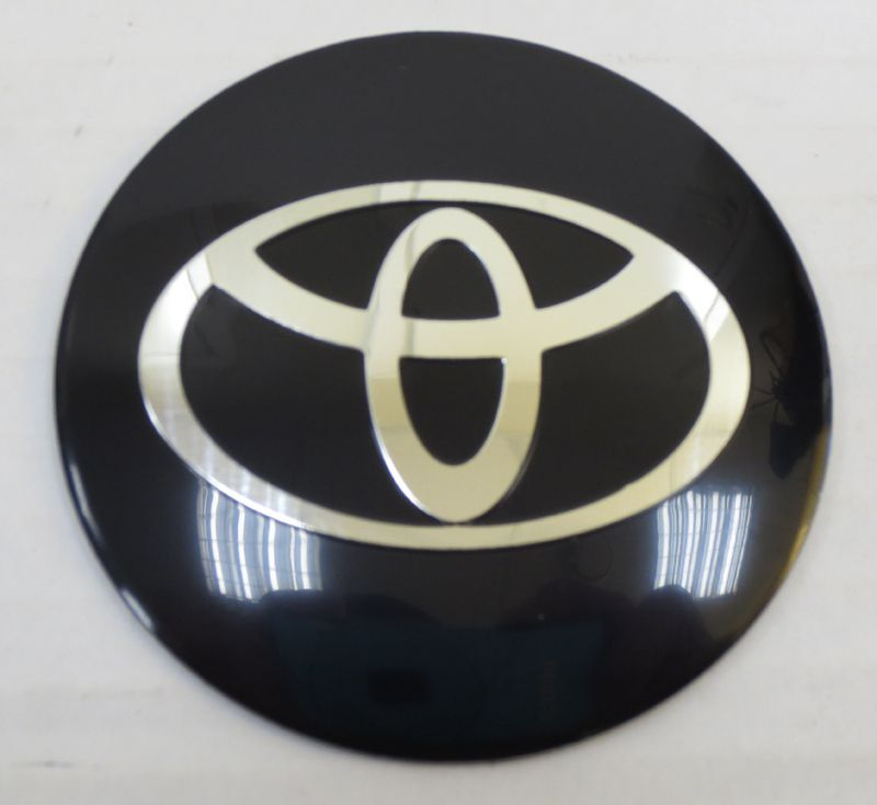 Наклейка OR-6 "TOYOTA" на автомоб, колпаки, диски (диаметр 65мм.) пластик/ комп. 4шт.  #1