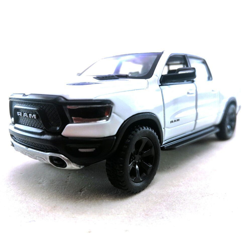 Машинка металлическая Додж Рам Dodge Ram 1500 2019 Kinsmart 1:46 5413DKT инерционная, цвет Белый  #1