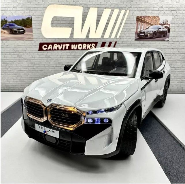 Машинка металлическая инерционная BMW XM белый, длина 21 см., масштаб 1:24, свет и звук, открываются #1