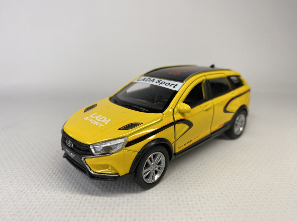 Модель машины Welly 1:34-39 Lada Vesta SW Cross #1