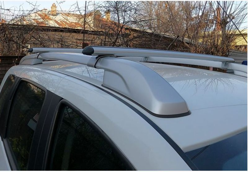 Багажник на рейлинги Nissan Terrano / Ниссан Террано 2014 - дуга аэро-эконом 50мм / silver опоры ULTRA-BOX #1
