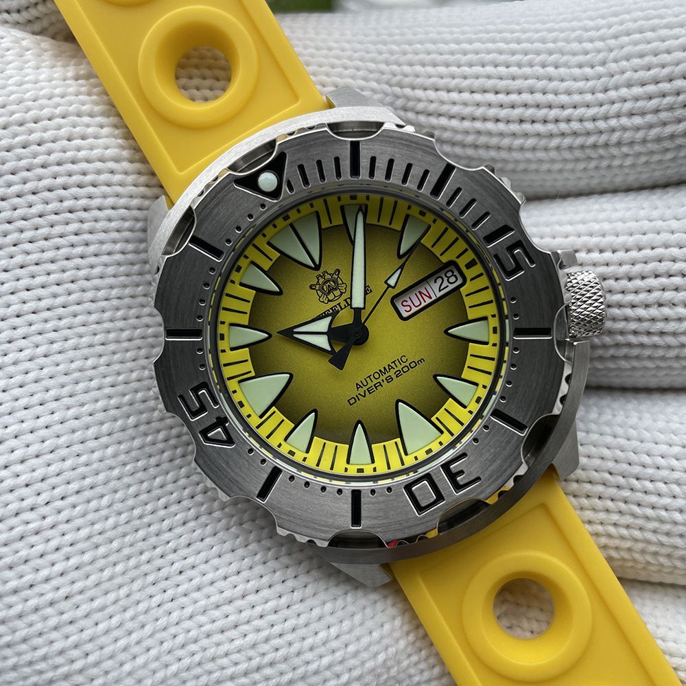 STEELDIVEЧасынаручныеМеханическиеSD1984Monster:механическиечасысавтоподзаводом,водонепроницаемость20бар,японскийкалибрNH36,сапфировоестекло,календарь-датаиденьнедели,швейцарскоепокрытиеSuper-LumiNova,ремешокизнержавеющейстали/резины,плаваниеидайвинг