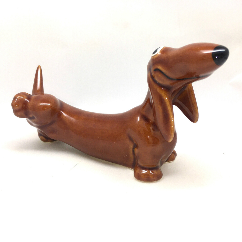 Статуэтка фарфоровая собака такса писающая рыжая #1