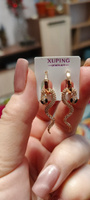 Серьги женские XUPING JEWELRY под золото с фианитами в форме змеи с чёрными глазами. Символ 2025 года #35, Марина Б.