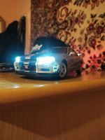 Коллекционная модель машинки Nissan Skyline GT-R R34 (Ниссан ГТР) масштаб 1:24 #30, Женя Р.