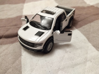 Машинка металлическая Kinsmart 1:46 2013 Ford F-150 SVT Raptor (Форд Раптор) 5365DKT инерционная, двери и багажник открываются / Белый #23, сергей л.