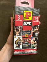 PANINI /Блистер с карточками Panini UFC 2022 (3 пакетика, 15 карточек) #8, Регина С.