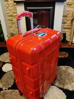 Чемодан на колесах сверхпрочный Supra Luggage STS-1007-M, candy apple из ABS-пластика с кодовым замком, 60 литров, 4 двойных колеса с поворотом на 360 градусов #53, Светлана С.