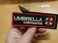 Нашивка на одежду на липучке, Стежкофф, "Umbrella corporation ", красный кант, 12,5х3,8 см, 1 штука #22, Игорь М.